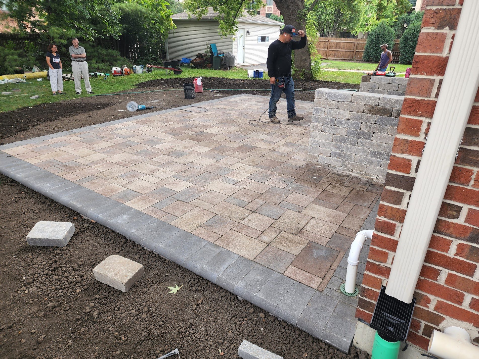 Driveway with brick column installation