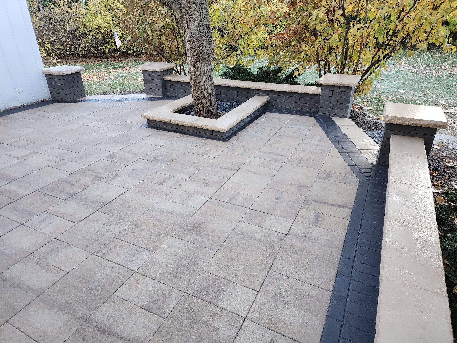 Large paver patio with lake view